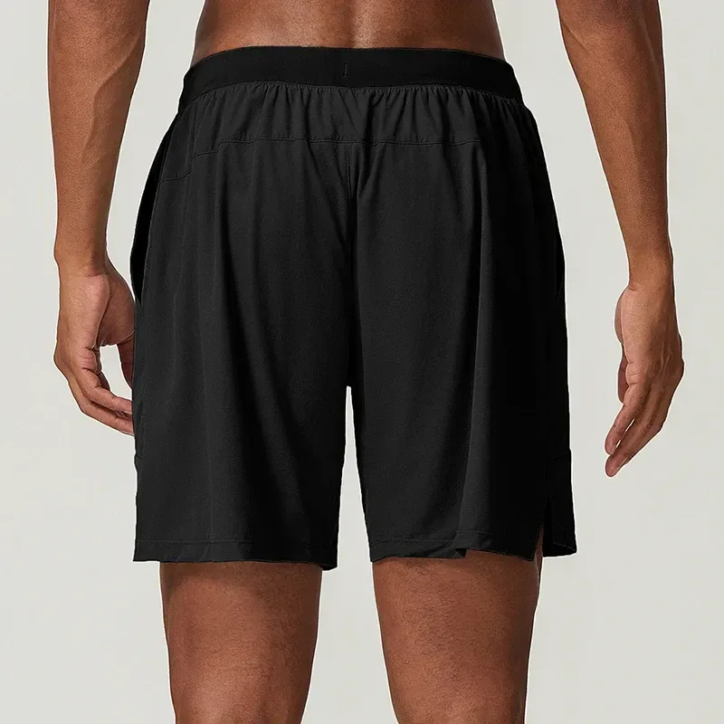 black stretch training shorts in a smooth woven fabric