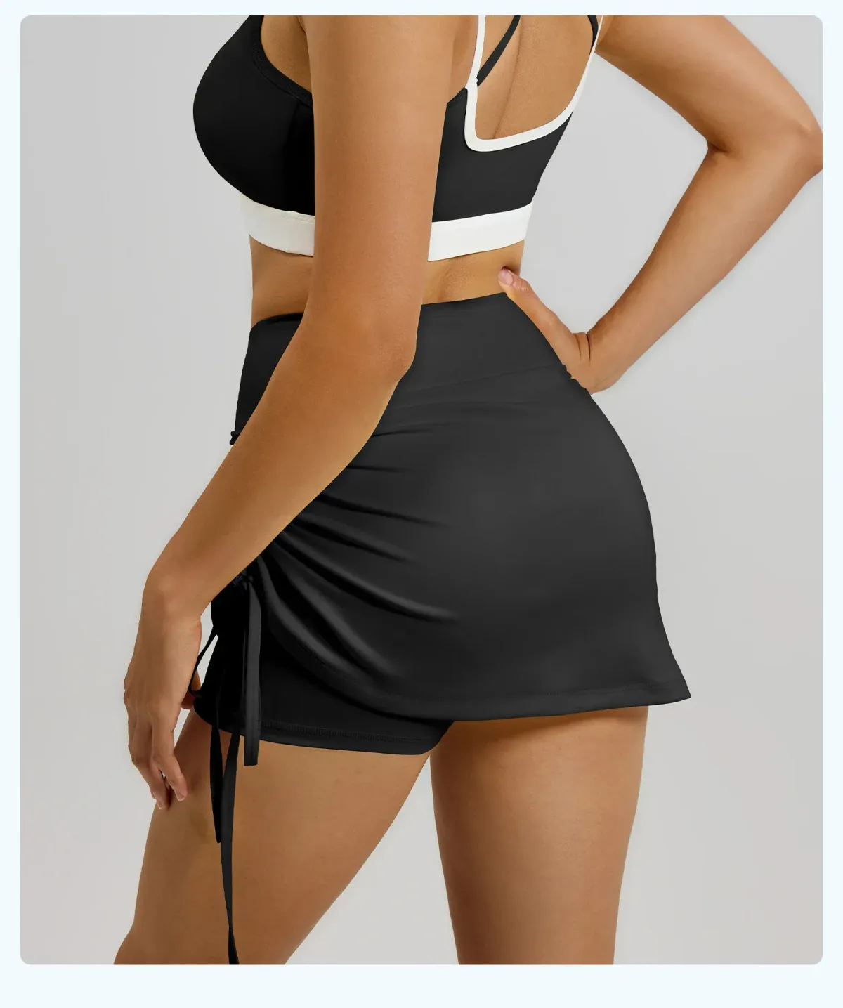back view of the black ruched high waisted skort