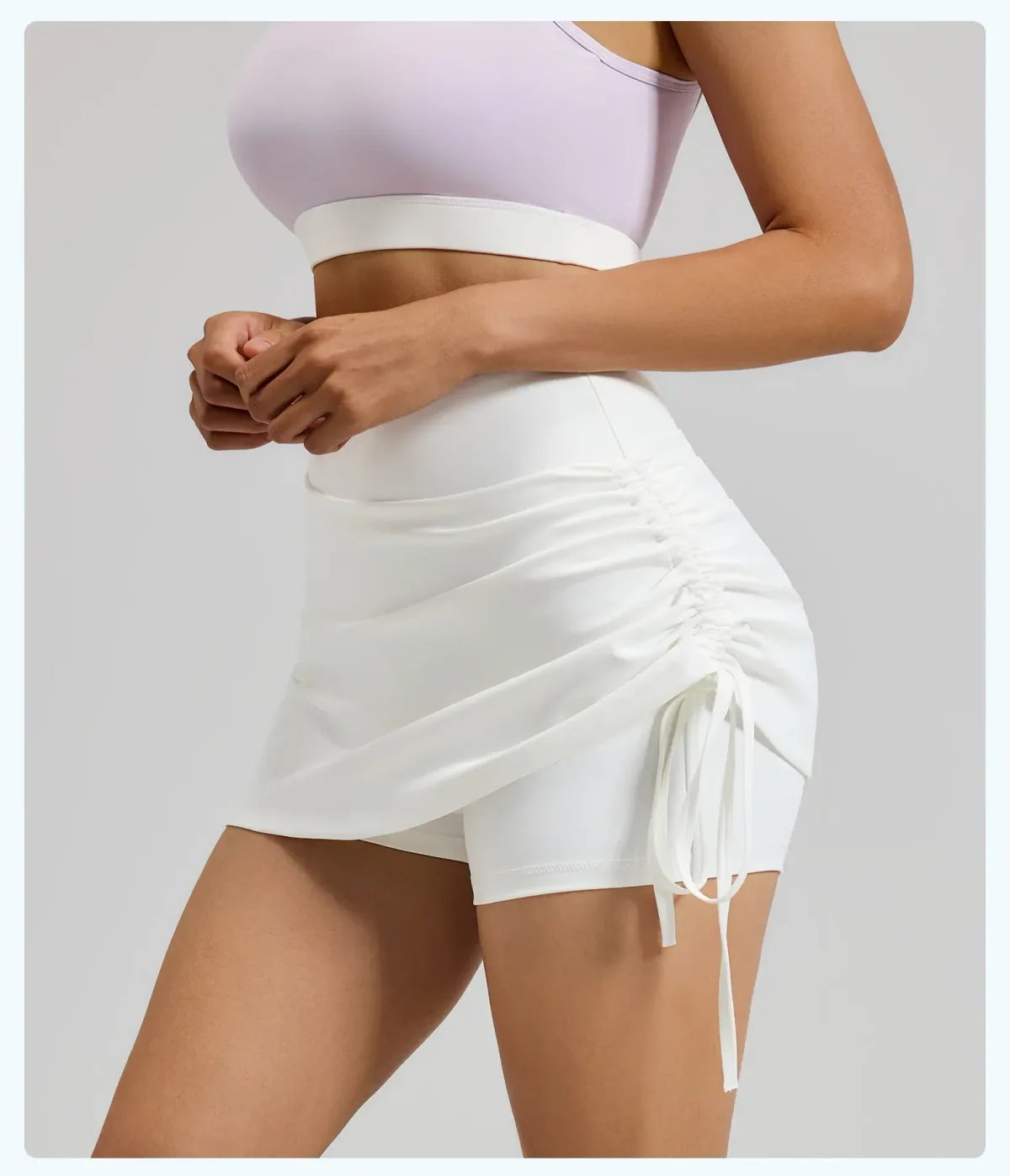 white skort side view showing the built in shorts underneath