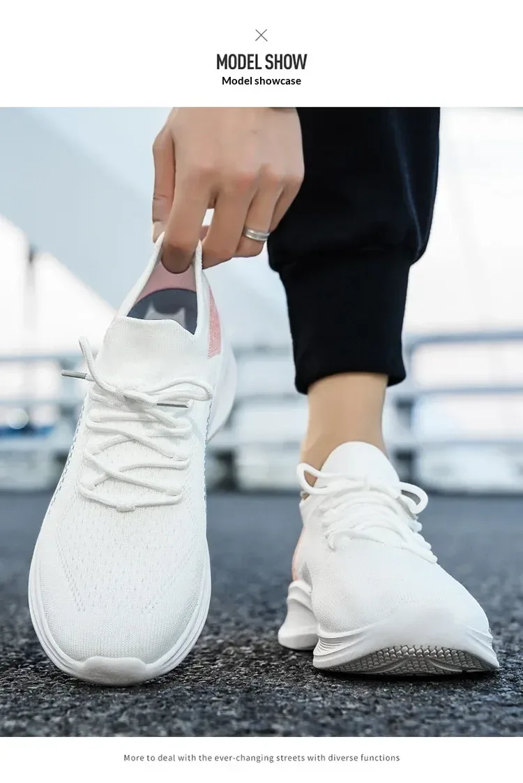hand pulling on a white knit running shoe by the collar