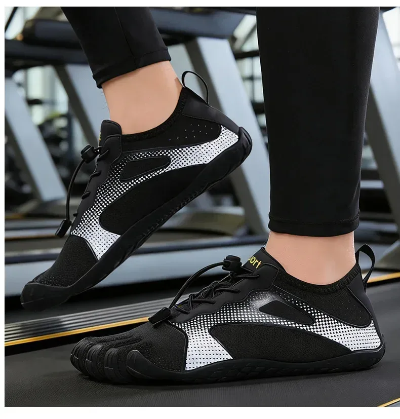 black print barefoot toe shoes worn on a treadmill