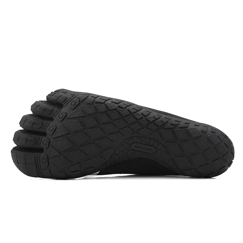 thin rubber sole of the barefoot toe shoes with deep tread