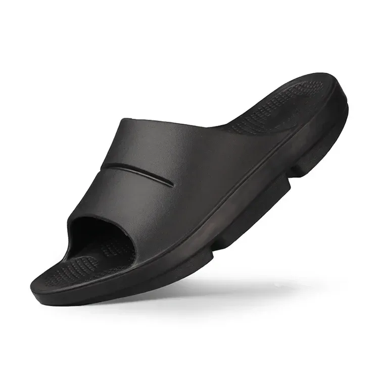 black recovery slide showing the contoured, textured footbed