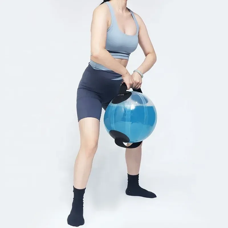 water filled training ball held low for a squat