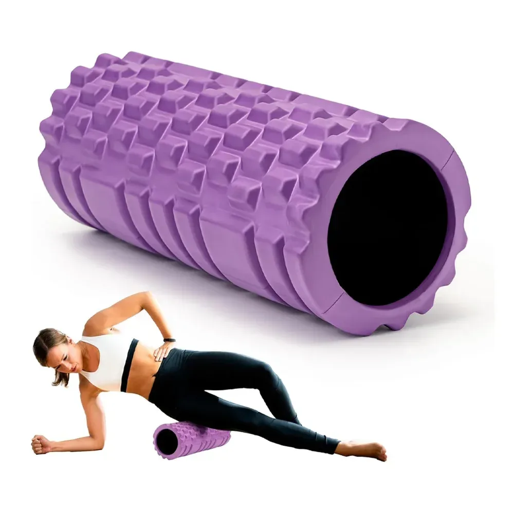 purple grid foam roller used during a warm up