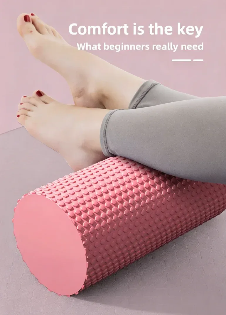 pink bump texture EVA foam roller under the calves